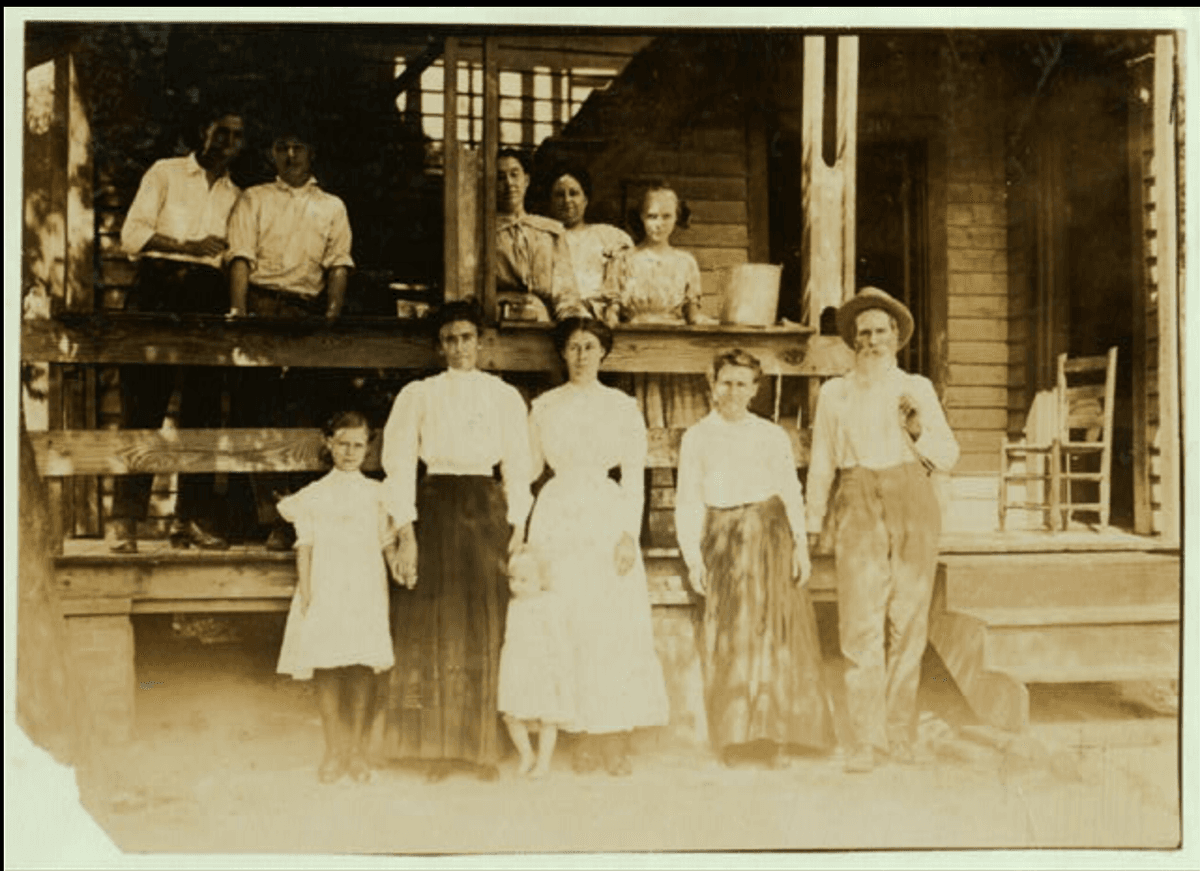 Faded vintage photo before restoration - blurry and damaged